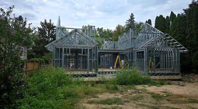 The Charlotte front elevation with exposed cold-formed steel framing, matching the exterior rendering