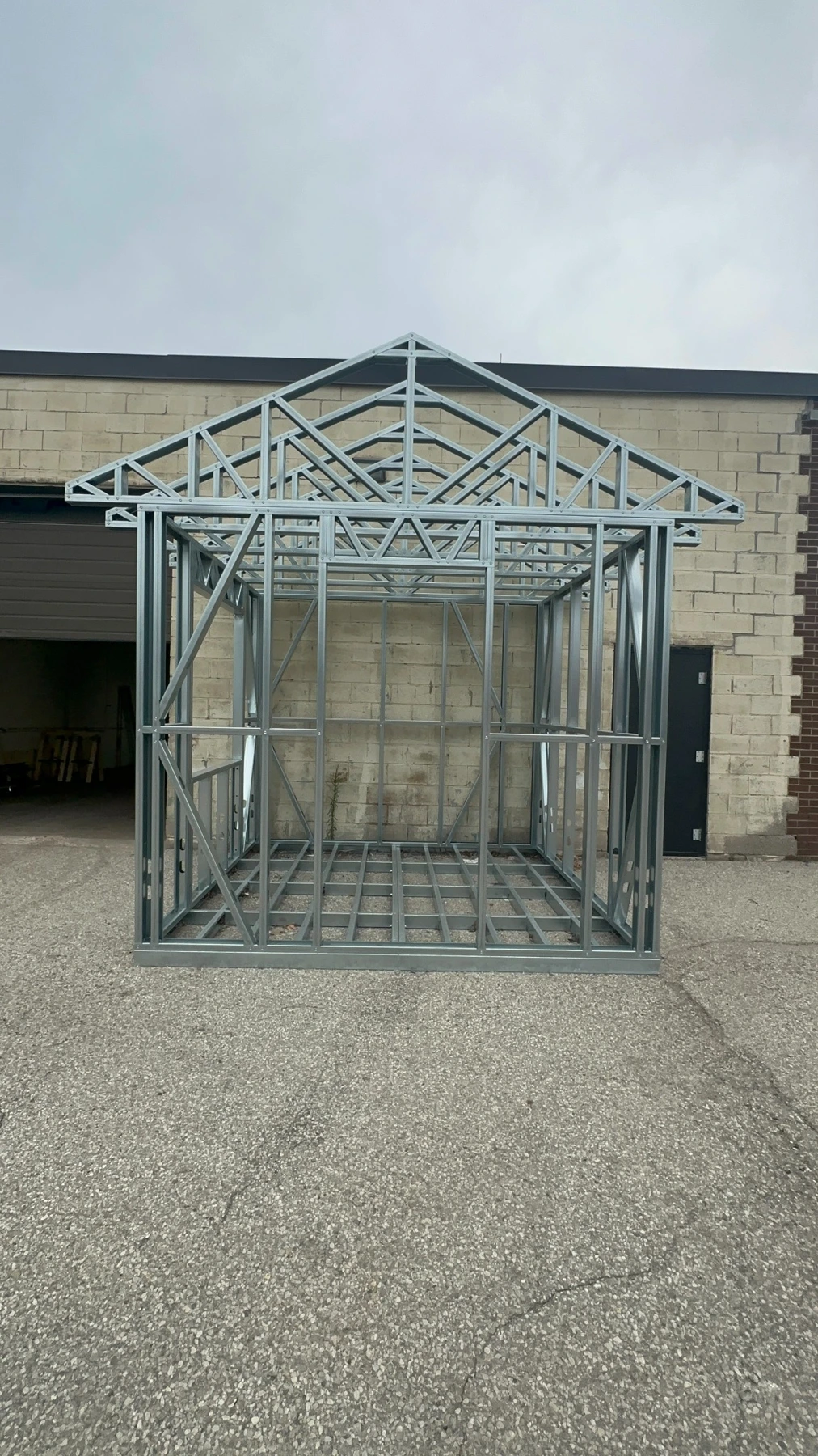 Cold-formed steel ADU frame with preassembled walls and roof trusses